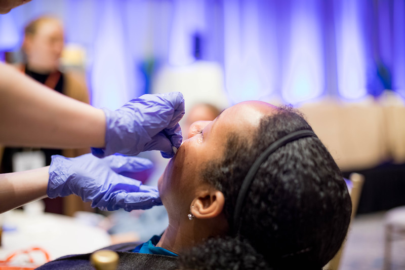 African American Woman Derm Procedure